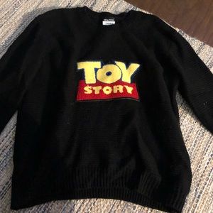black knit toy story sweater